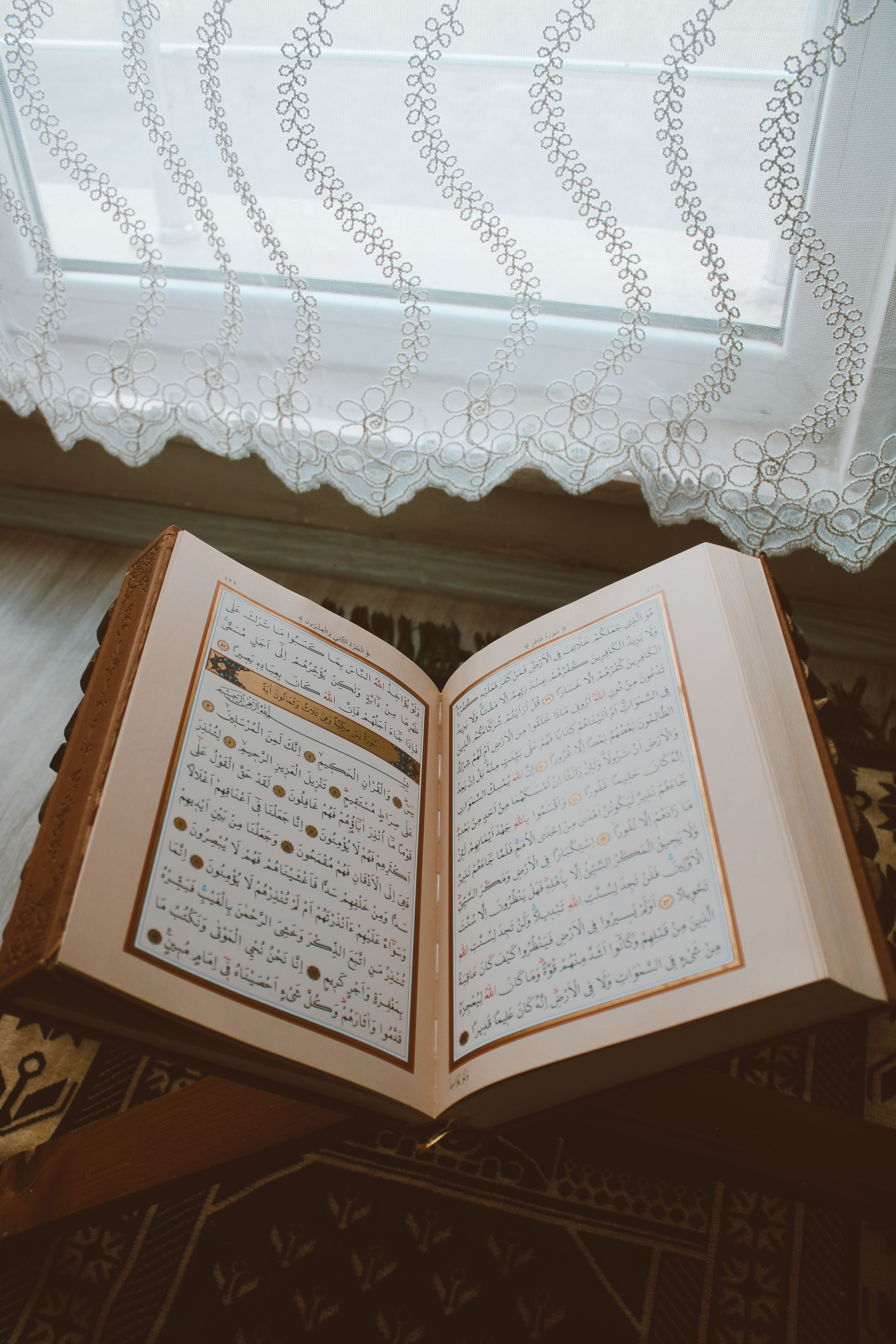Open Quran on wooden rehal stand - Learn Quran Online